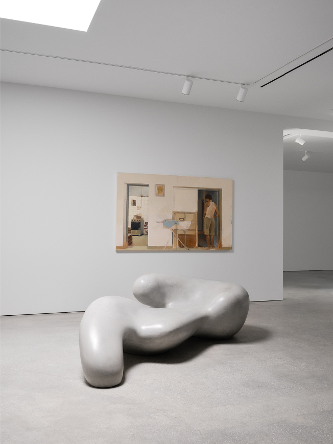 Sculptural biomorphic bench by Rich Mnisi, hand-formed by Plaster Art in smooth grey cement.
